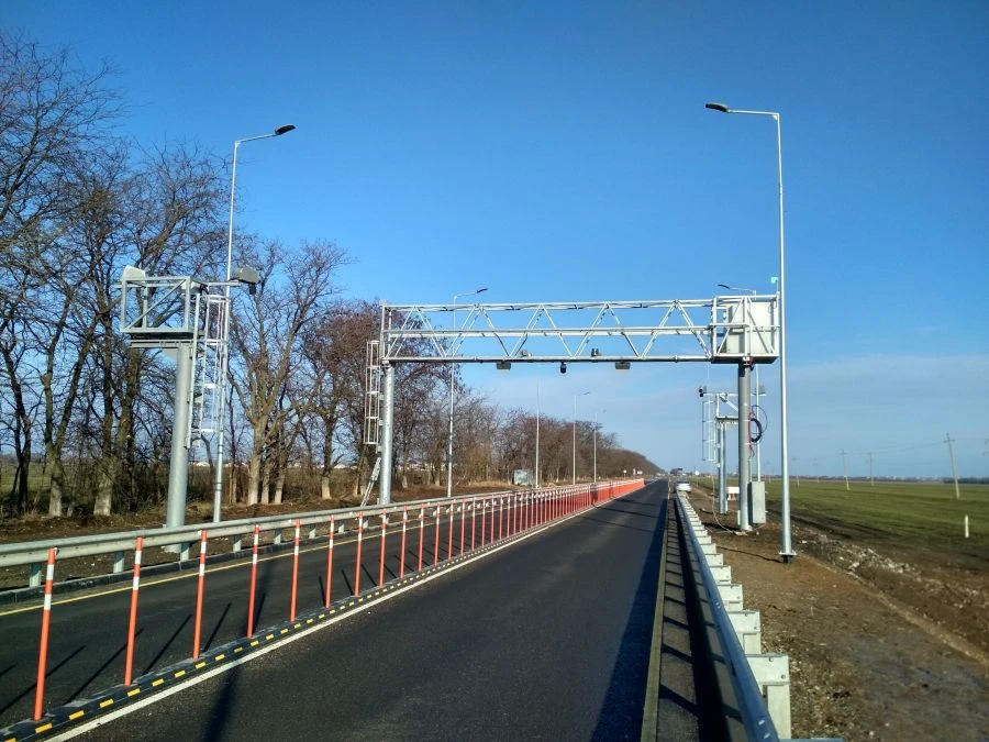 Automatic Weight and Dimension Control System for Moving Vehicles